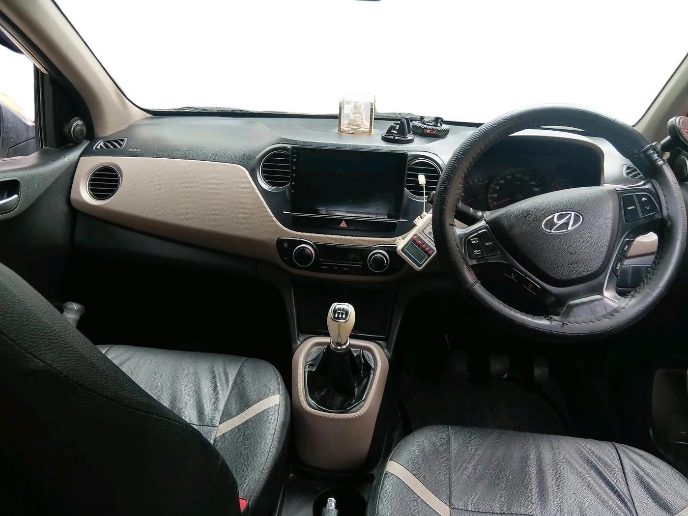 2014 Hyundai Xcent SX 1.2 (O), Petrol, Manual, 1,00,560 km, interior