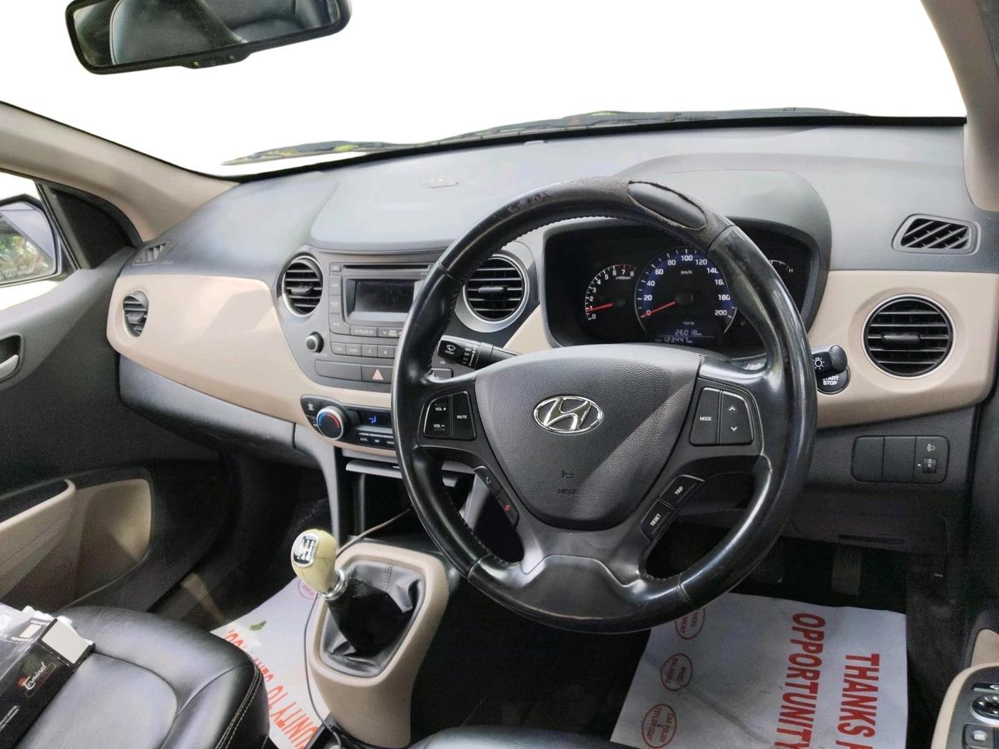 2014 Hyundai Xcent SX 1.2 (O), Petrol, Manual, 1,23,447 km, interior